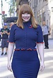 Flaunting her enviable curves! Bryce stunned in a matching navy shirt ...