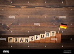 Frankfurt. Name of the city from wooden letters and the German flag ...