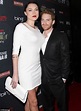 Seth Green is happily dwarfed by his statuesque (and shapely) wife ...