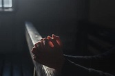 Hands Praying in Church Royalty-Free Stock Photo