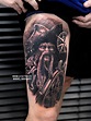 Black and grey style Davy Jones tattoo on the right