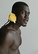 "Charming Young Man With A Yellow Rose Behind His Ear" by Stocksy ...