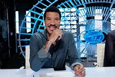 Lionel Richie sits at the Judges' Desk waiting to see the talent at ...