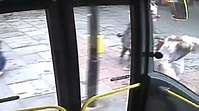 Moment woman pushed towards London bus - BBC News