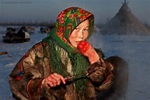 Eurasia: Nenets girl eating raw reindeer meat, Siberia, Russia | People ...