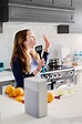 "Teen Girl Singing To Music In The Kitchen" by Stocksy Contributor ...