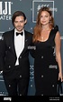 Tom Payne and wife Jennifer Akerman attends the 25th Annual Critics ...
