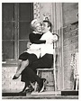 Ginger Rogers cuddles with husband, John Vivyan, in the musical version ...