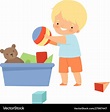 Little boy gathering his toys and tidy up his room