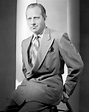 Portrait Of Melvyn Douglas Sitting On Stool Photograph by Globe Photos ...