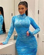 Kylie Jenner flaunts curvaceous figure in clinging aqua dress for ...