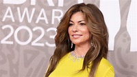 Shania Twain dazzles in crop-top and fishnets for extra special Queen ...