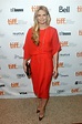 Jennifer Morrison created a fashionable pairing with a red draped ...