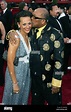 US composer Quincy Jones (R) kisses his wife Rashida Jones (L) on the ...