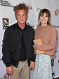 Sean Penn, 59, and girlfriend Leila George, 27, hold hands as they make ...