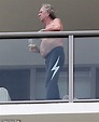 Keith Richards, 75, goes shirtless as he enjoys a drink on the balcony ...