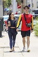 camila mendes and charles melton share a kiss as they leave the gym in ...