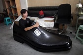 Asian man sitting in a giant shoe (1531 x 1024) : r/photoshopbattles