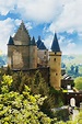Vianden castle in Luxembourg sits on top of the city. Amazing Places On ...