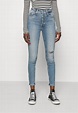 Calvin Klein Jeans HIGH RISE ANKLE - Kitsa lõikega teksad - denim ...