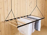 This Hanging Clothes Drying Rack Can Be Raised And Lowered Using A ...