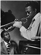 A 21 year old unknown Miles Davis carefully studying Trumpeter Howard ...