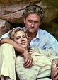 Michael Douglas as 'Jack Colton' & Kathleen Turner as 'Joan Wilder' in ...