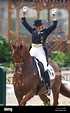 German dressage rider Heike Kemmer celebrates on her horse 'Bonaparte ...