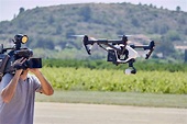 Camera men film the drone in flight - Robotics Business Review