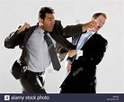 Three Business People Fighting Stock Photos & Three Business People ...