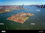 USA, New Jersey, Aerial of Ellis Island and skyline of Manhattan Stock ...