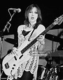 British musician Ghislaine 'Gil' Weston performing on stage with punk ...