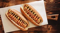 Perché si chiama "hot dog"? Storia e origine del panino dal sapore ...