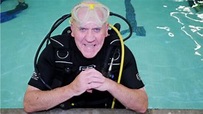 Brian Wall passes ocean diver scuba course at age of 74 - BBC News