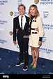 Brian Grazer and Veronica Smiley walking on the red carpet at the NRDC ...