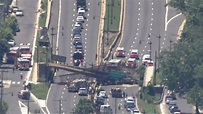 Pedestrian bridge collapses onto Washington, DC, highway, injuring ...