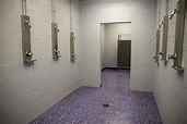 Boy’s locker room showers at the new multi-purpose center opened in ...