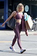 kristen bell hits the gym in a mauve crop top with matching leggings ...