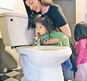 林熙蕾抱女飲「廁所水」 - 東方日報