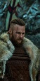 Ubbe Ragnarsson wearing animal fur, with his hair braided and a small ...