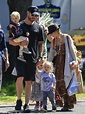 Chris Hemsworth carries twin sons Tristan and Sacha on family day out ...