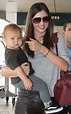 Miranda Kerr arrives at LAX with her exhausted son Flynn after a long ...