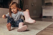Little girl wearing boots stock photo (148364) - YouWorkForThem
