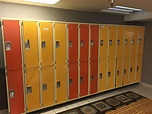 WALL OF ASSORTED METAL GYM LOCKERS