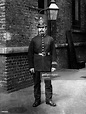 A London policeman wears the uniform of a late 19th, century City of ...