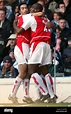 Arsenal's Robert Pires and goalscorer Sol Campbell celebrate after the ...