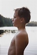 "Profile Portrait Of Pre-teen Boy After Swimming In Lake In Summer" by ...