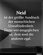 a black and white photo with the words neid in german on it's side