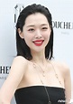 Sulli recently attended an event where she appeared in a black mini ...