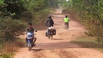 Laos Reise Doku Radreise: holprige Lehmpiste am Mekong - YouTube